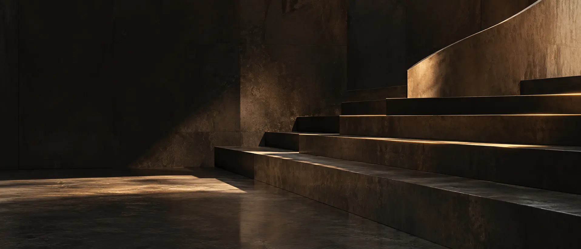 Dark stepped stone planes defined by restrained lines of warm edge light.